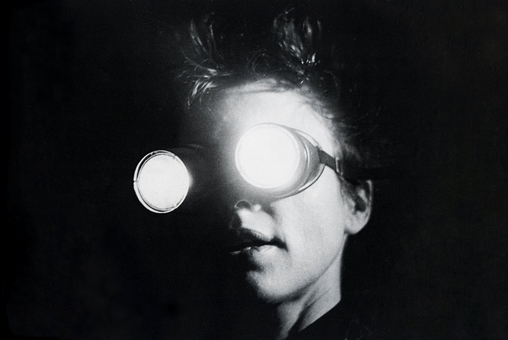 laurie anderson on stage closeup with light googles